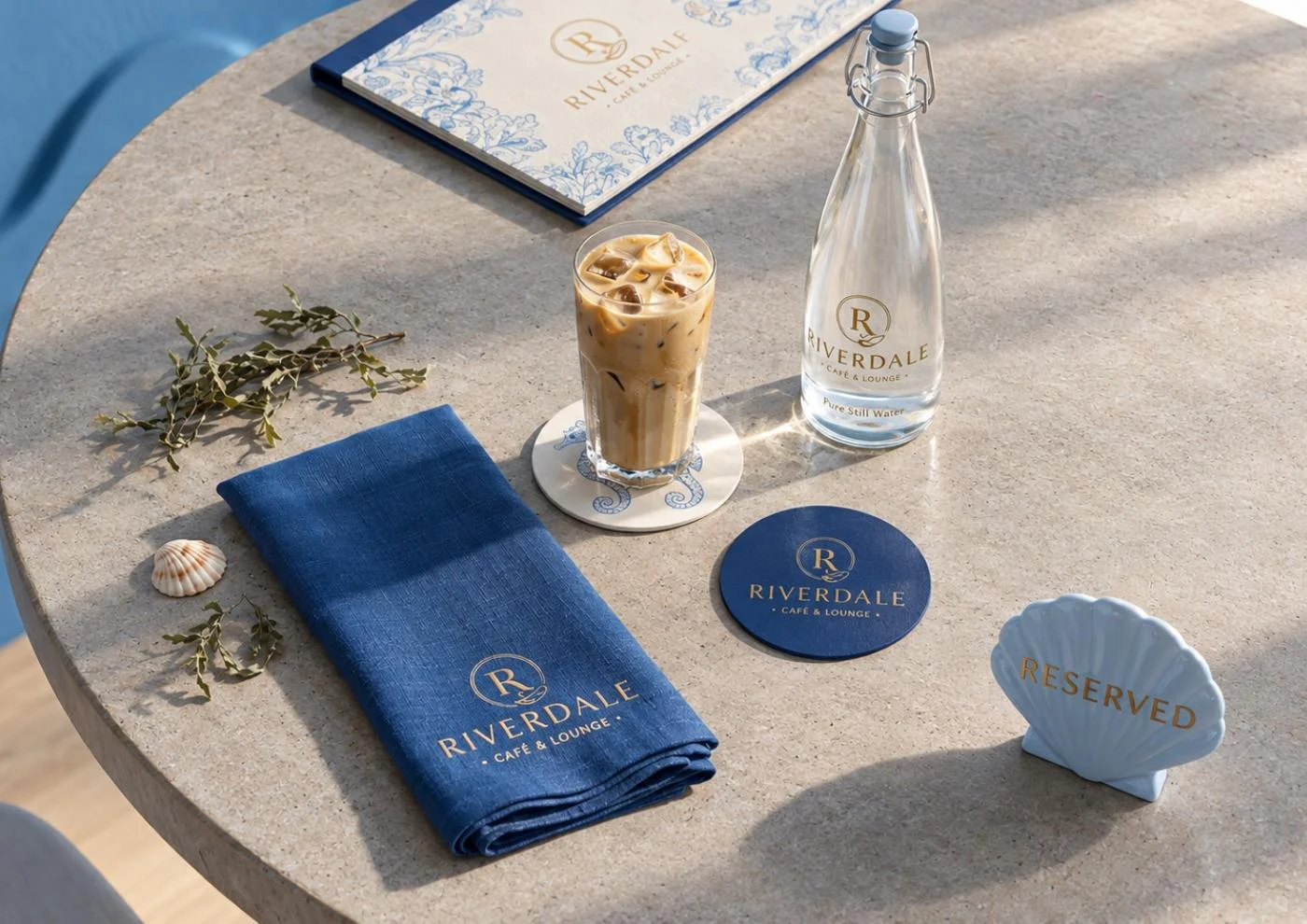 Hospitality presentation mockup with blue table linen, menu and coordinated table accessories